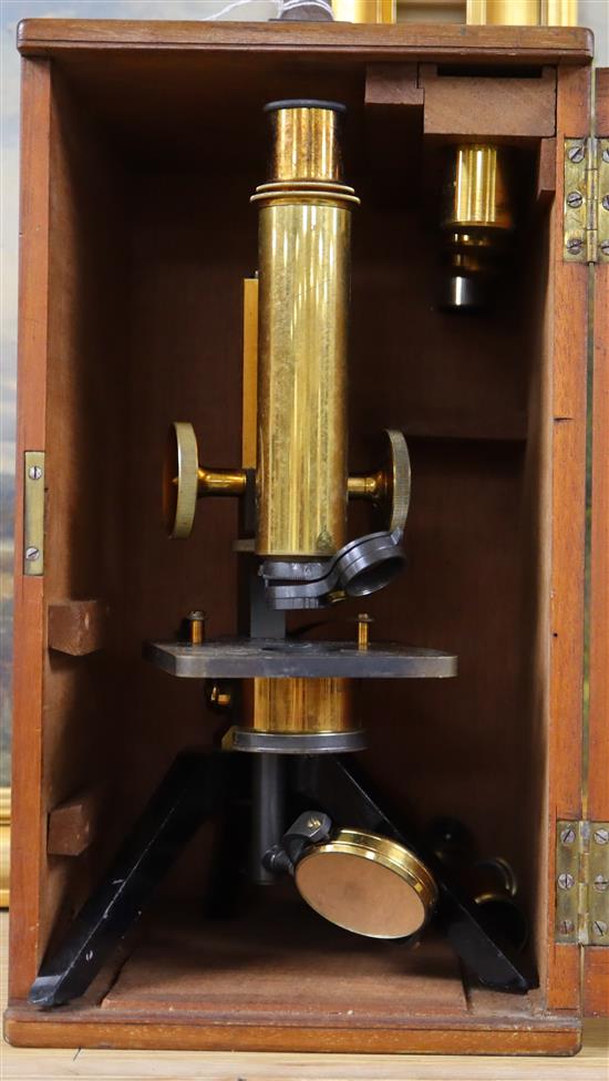 An early 20th century W Watsons & Sons mahogany cased microscope